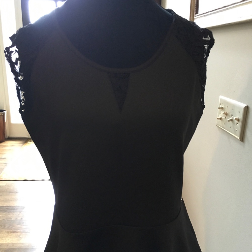 NWT Black peplum top with lace  cap sleeves
